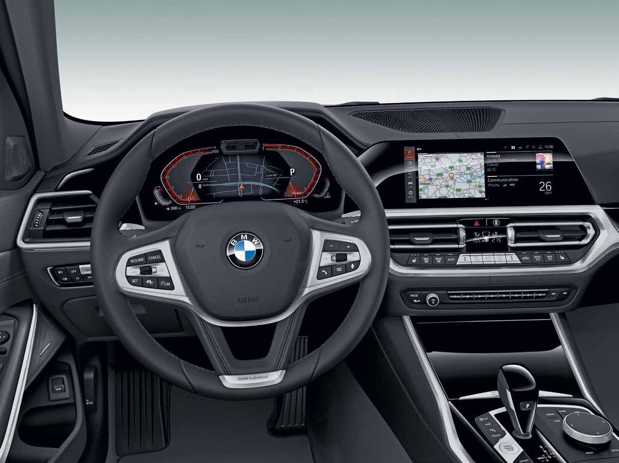 BMW 3 Series LWB — Driver-focused cockpit with sport steering wheel