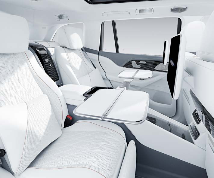 Mercedes-Benz Mercedes-Maybach GLS — Fold-out rear folding tables integrated into the business console