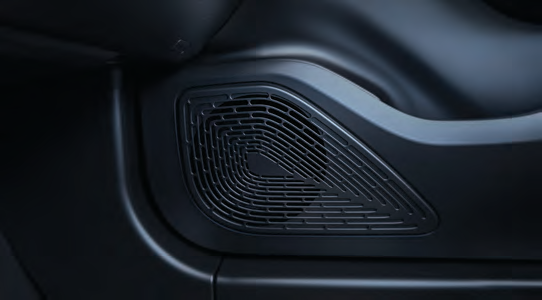 VinFast VF 7 — Door-mounted speaker from the 8-speaker audio system