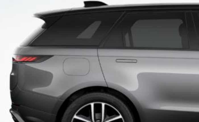 Land Rover Range Rover Sport — Rear quarter showing the slim connected LED tail lights, gloss-black floating roofline and integrated roof spoiler.