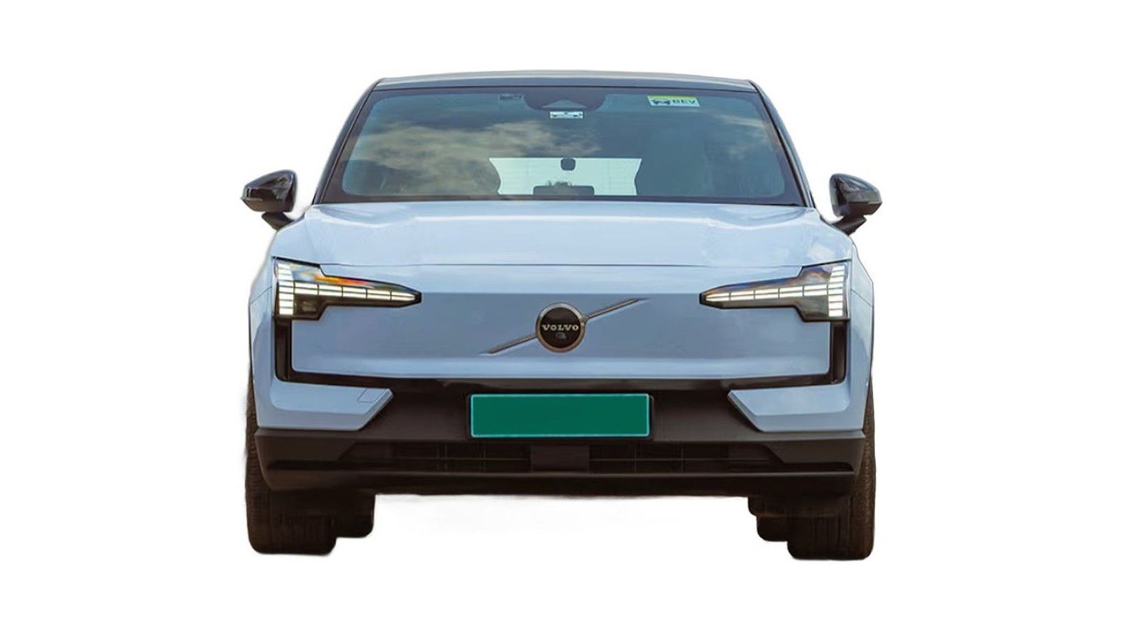 Light blue Volvo EX30 electric vehicle photographed from front, showing grille and headlights.
