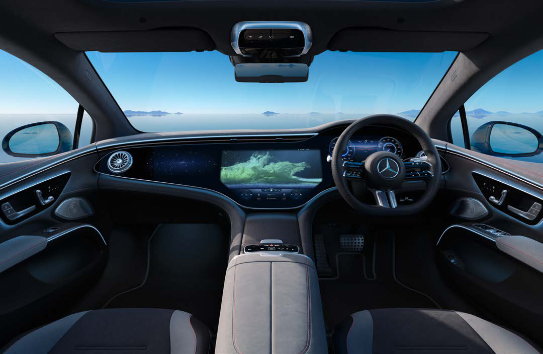 Mercedes-Benz EQS — Driver-focused cabin with the MBUX Hyperscreen and panoramic glass roof