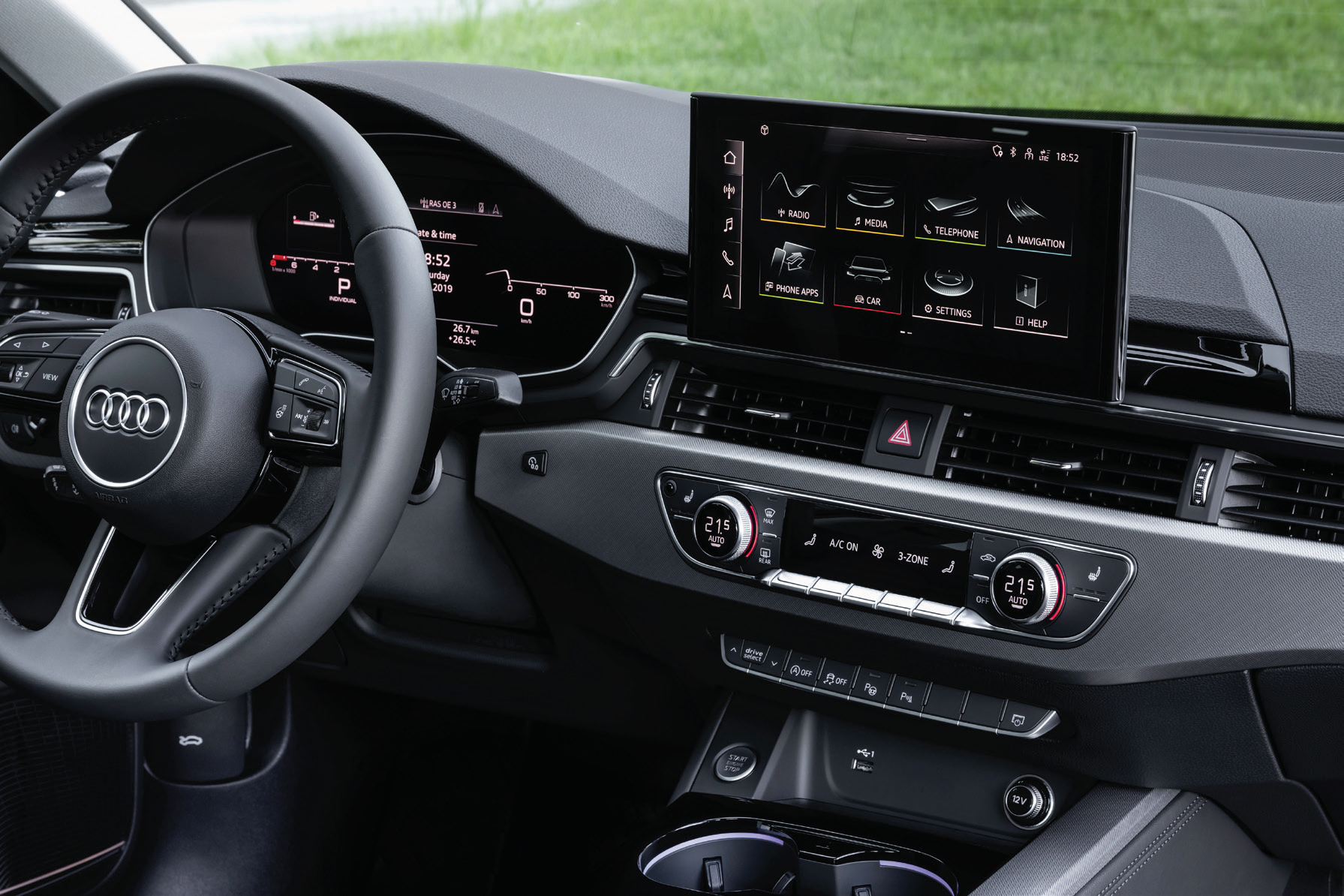 Audi A4 — MMI touchscreen infotainment with dual-zone climate controls