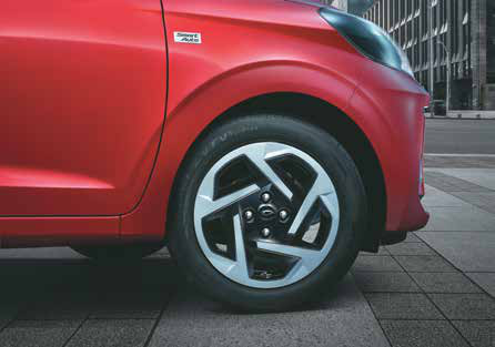 Hyundai Grand i10 Nios — R15 (380.2 mm) dual-tone styled steel wheel (Corporate)