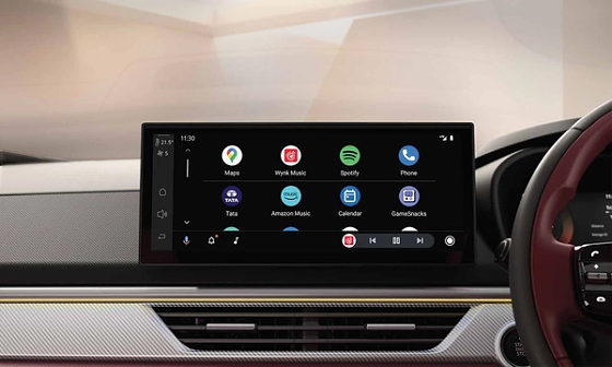 Tata Curvv, 31.24 cm (12.3-inch) touchscreen infotainment by Harman with wireless Android Auto and Apple CarPlay.