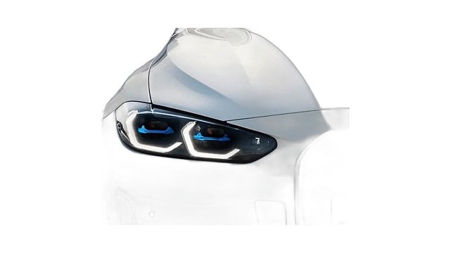 White BMW i4 headlight with LED rings and blue accent lighting detail.