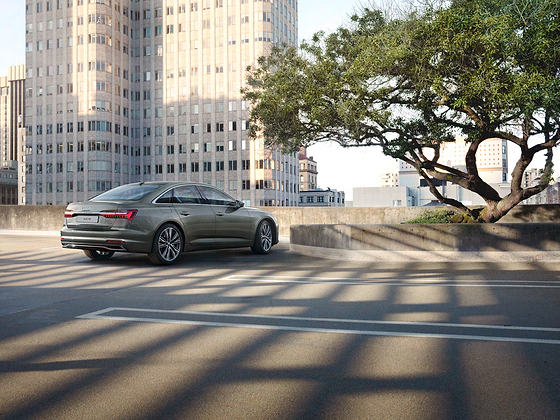 Audi A6, Rear three-quarter profile with sculpted shoulder line and slim tail lamps