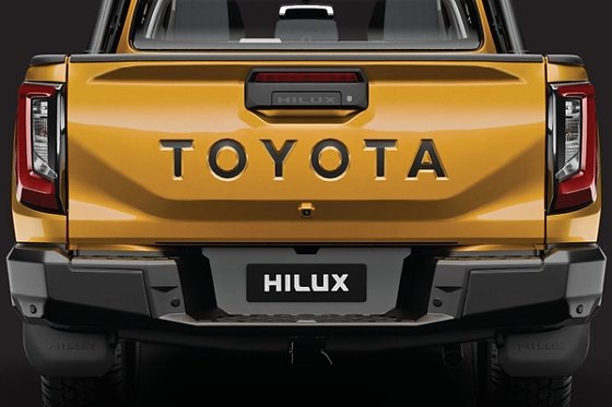 Toyota Hilux, Muscular tailgate with embossed TOYOTA lettering and LED tail lamps.