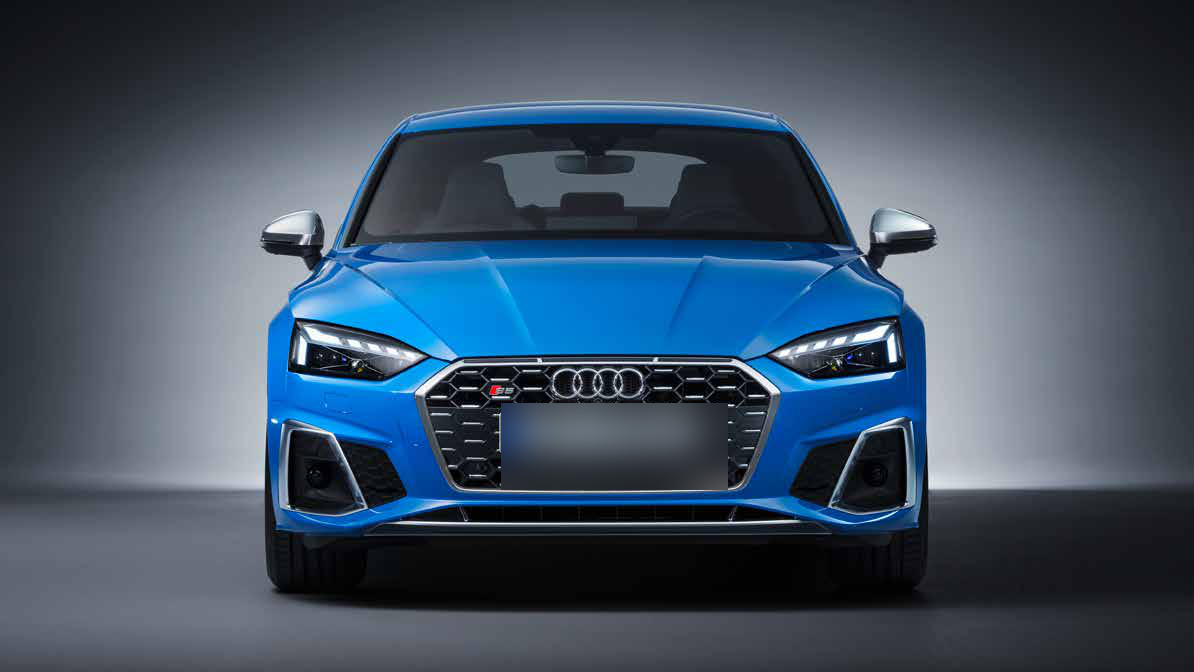 Audi S5 Sportback — Matrix LED headlights flank the honeycomb Singleframe grille wearing the S5 badge