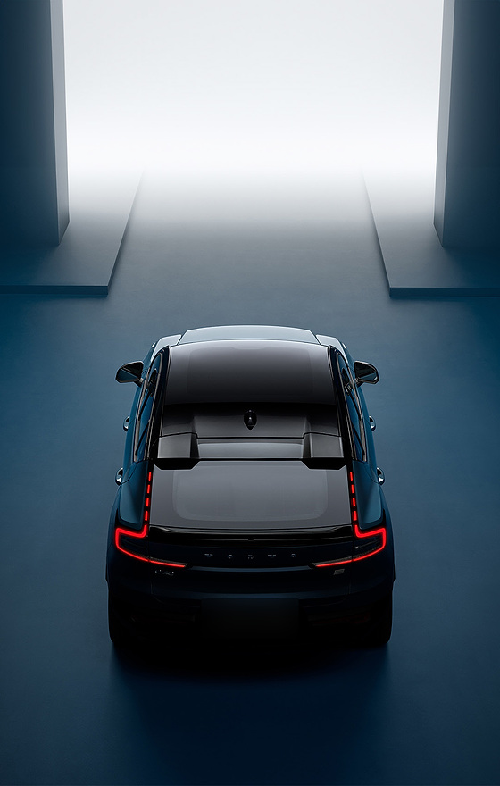 Volvo EC40, Overhead view of the coupe-SUV rear showing the full-width connected LED tail-light signature and the slim roofline.