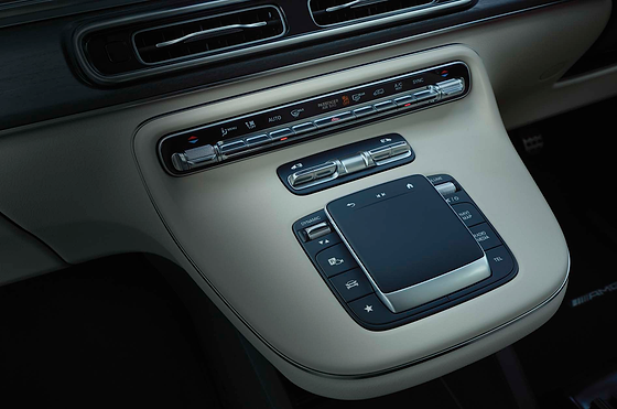 Mercedes-Benz V-Class, Centre-console touchpad controller with haptic feedback alongside the physical climate-control panel for the private suite.