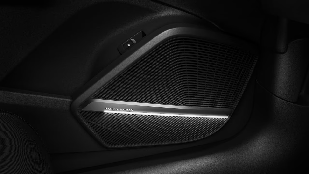 Audi Q5 — Bang & Olufsen Premium Sound System speaker with illuminated grille.