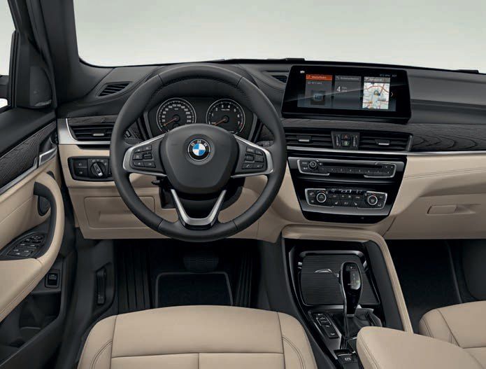 BMW X1 — Driver-focused cockpit with digital displays