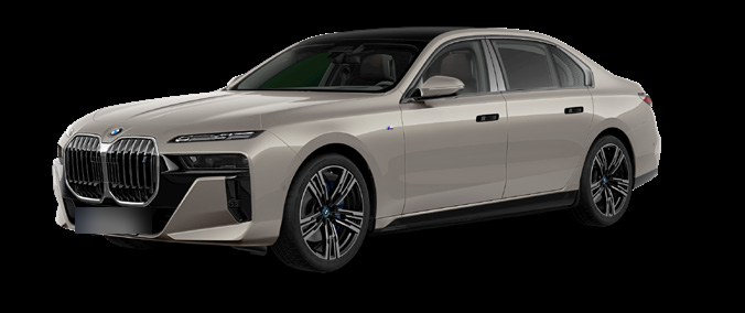 BMW i7 — Front three-quarter view of the BMW i7 showing the 'Iconic Glow' illuminated kidney grille, Crystal Headlights and 21-inch M light-alloy Star-Spoke wheels.