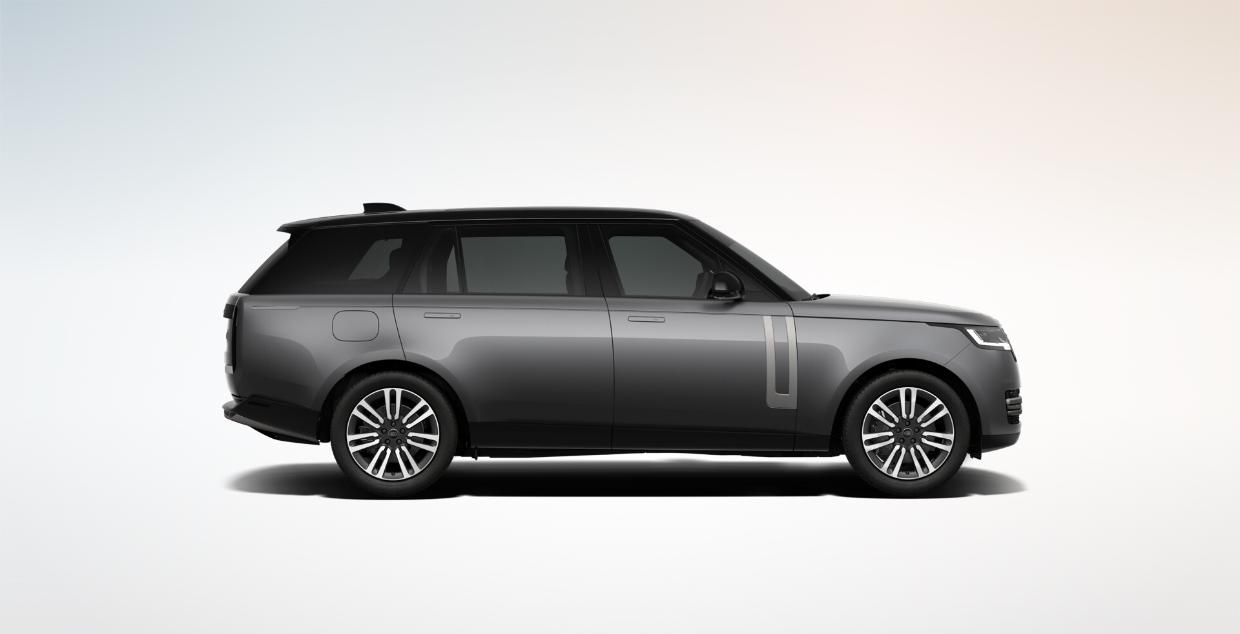 Land Rover Range Rover — Long-wheelbase side profile with flush deployable door handles and multi-spoke diamond-turned alloy wheels.