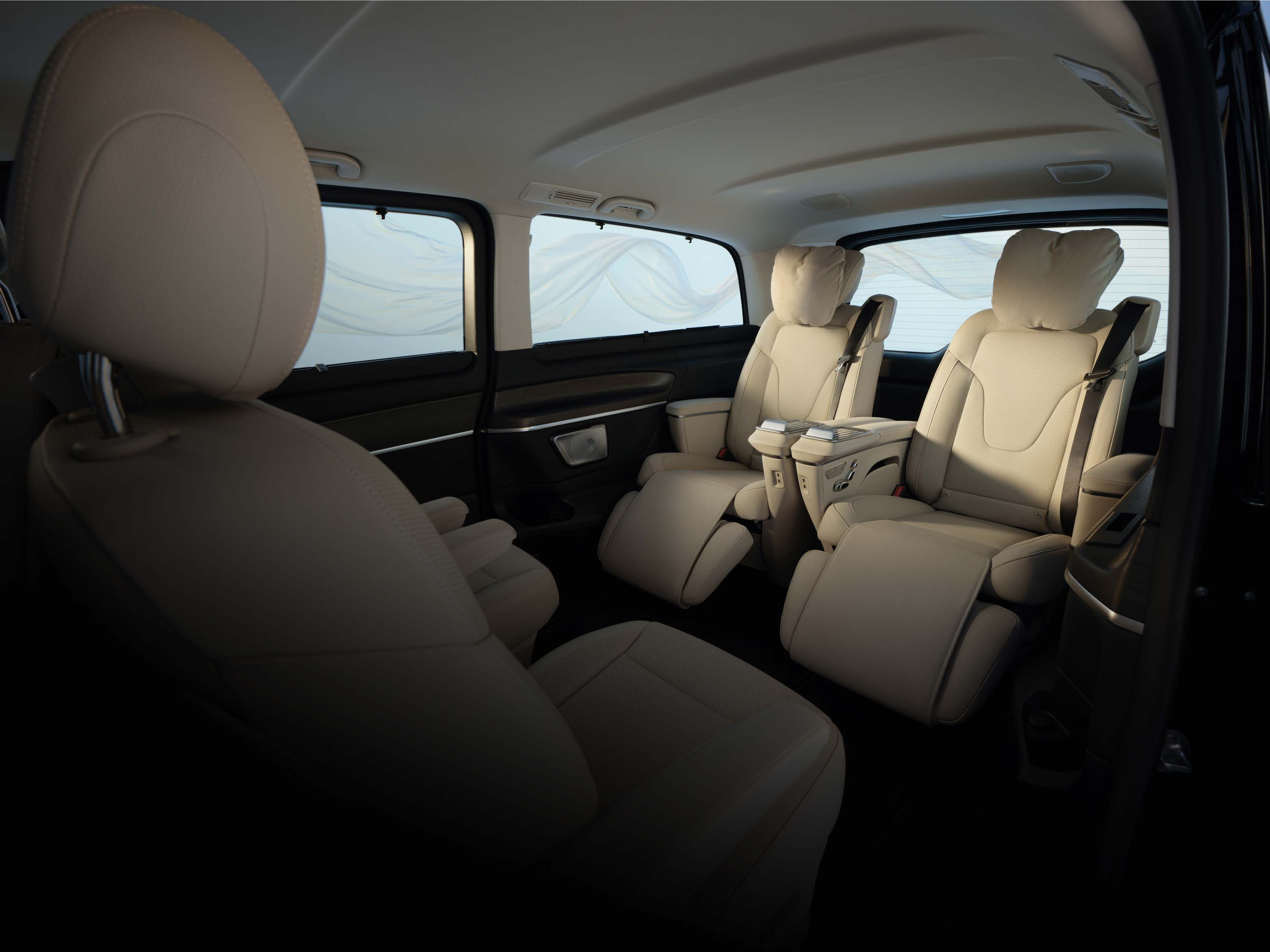 Mercedes-Benz V-Class — Ventilated multicontour rear seats with adjustable calf support recline within the beige-leather cabin, ahead of the removable third row.