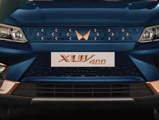 Mahindra XUV400, Signature front grille with copper twin-peaks logo and X-motif detailing