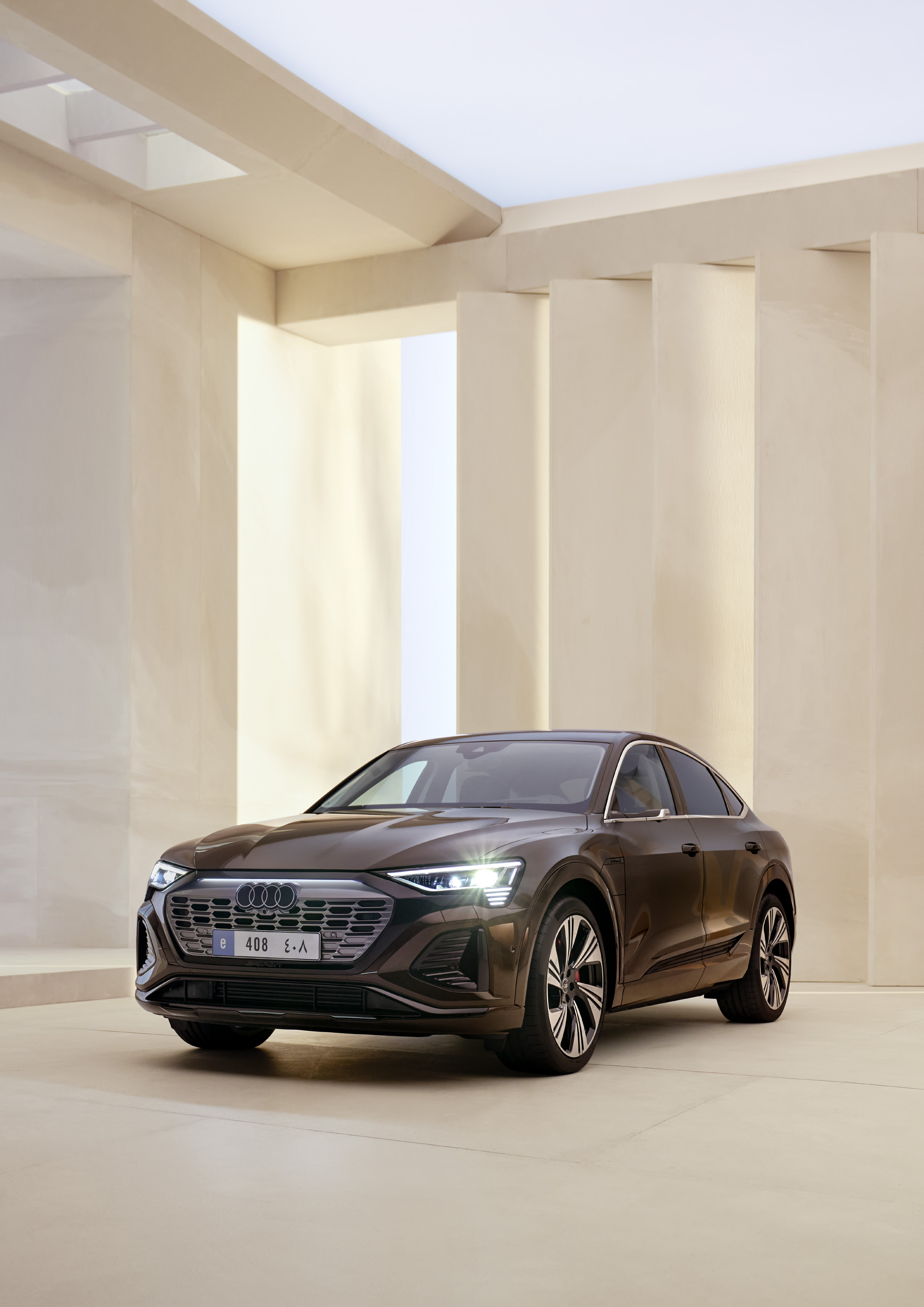 Audi Q8 Sportback e-tron — Bold body-coloured Singleframe grille and sloping Sportback roofline