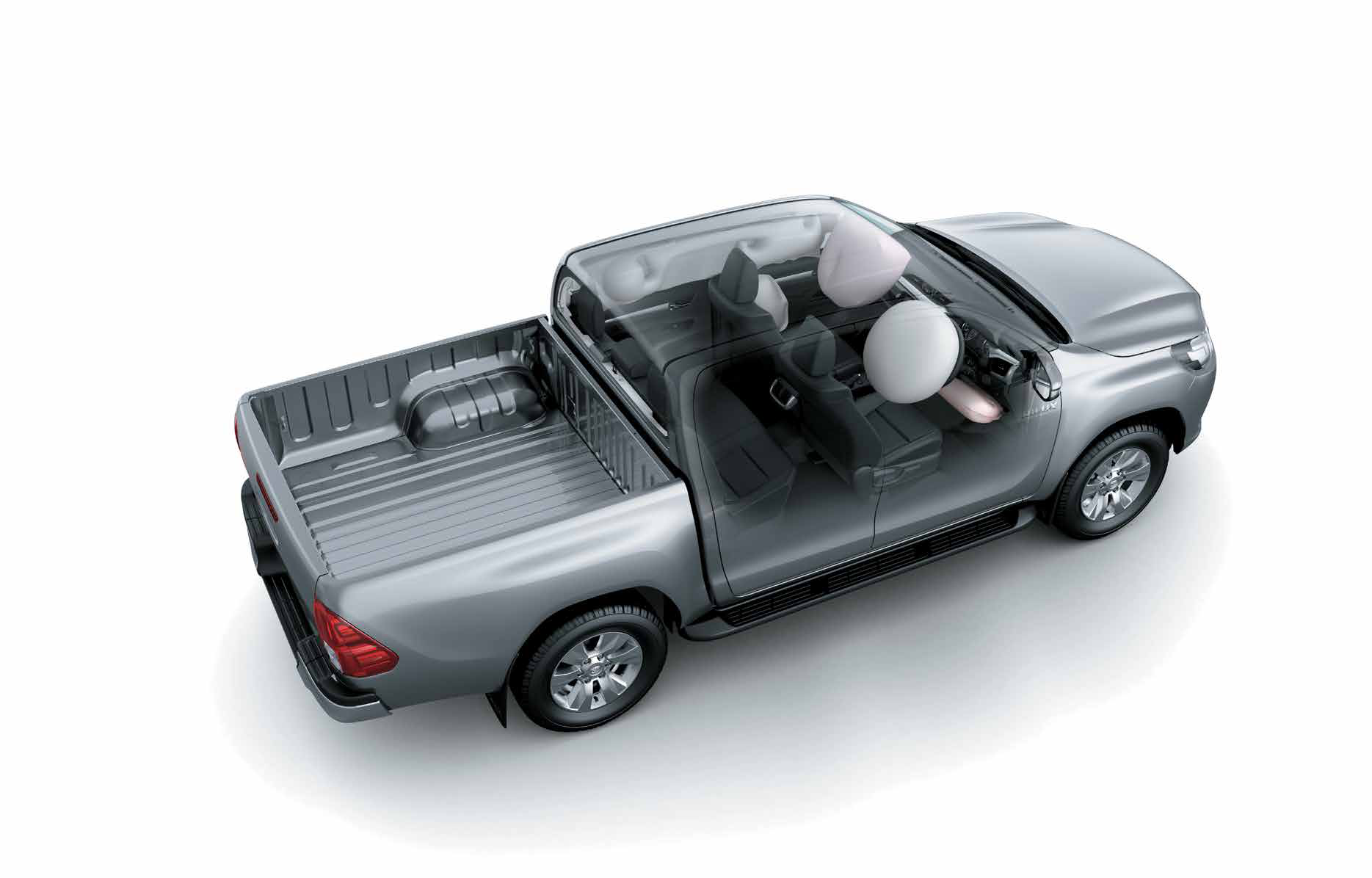 Toyota Hilux — Cutaway shows airbags deployed to protect front and rear occupants.