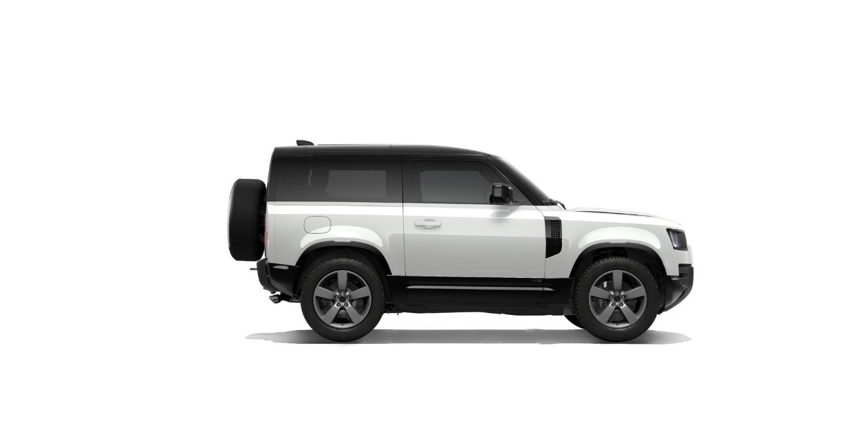 Land Rover Defender — Side profile of the short-wheelbase Defender 90, highlighting the tailgate-mounted spare wheel and contrast floating roof.
