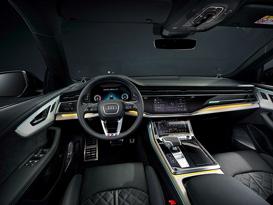 Audi Q8, Driver-focused cabin with dual displays, S-line steering wheel and centre console.