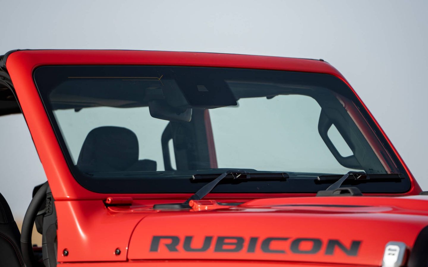 Jeep Wrangler — Fold-down front windscreen with exposed hinges and the RUBICON bonnet decal