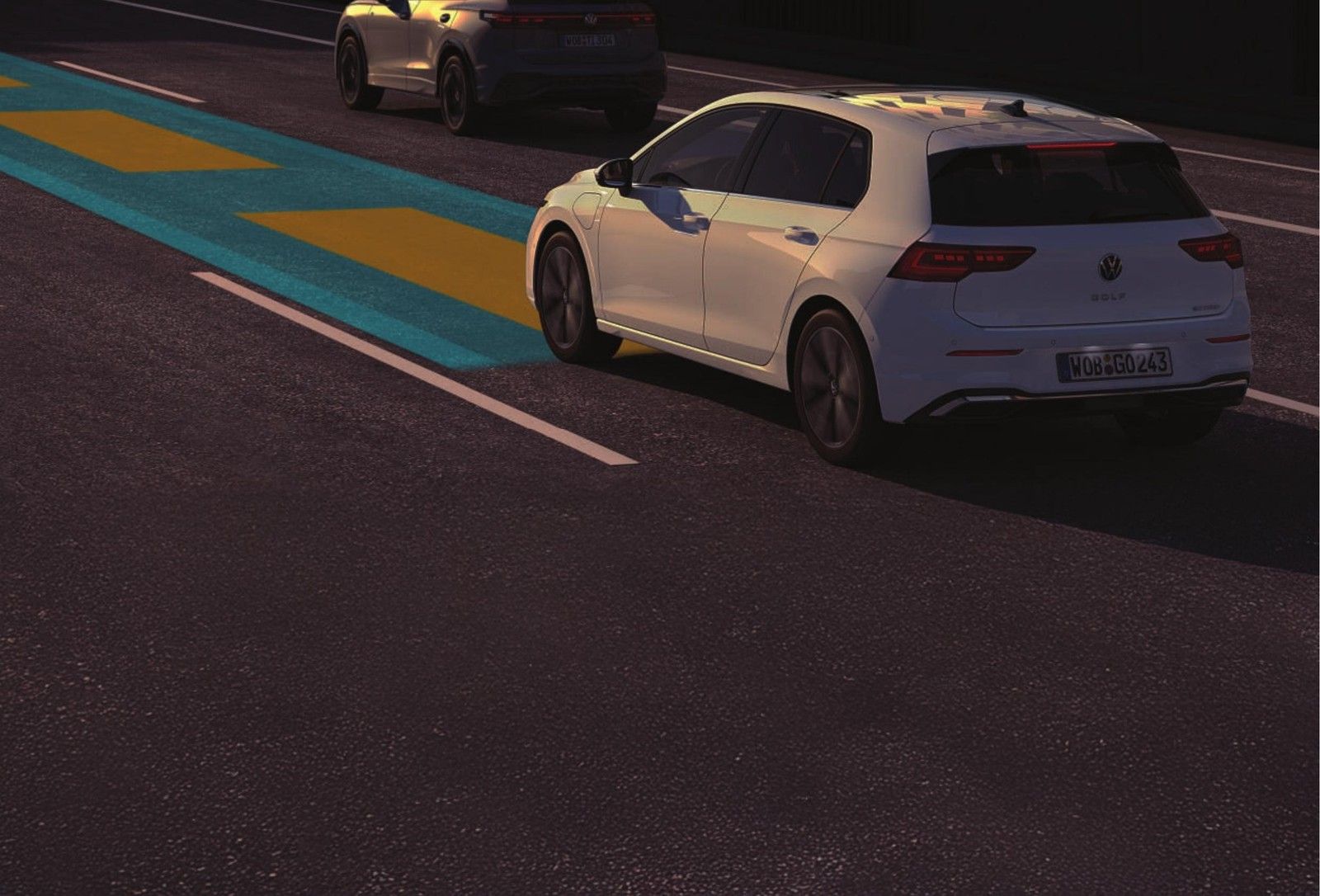 Volkswagen Golf GTI — The Golf GTI on a lane-marked road, illustrating its lane-keeping and driver-assistance features.