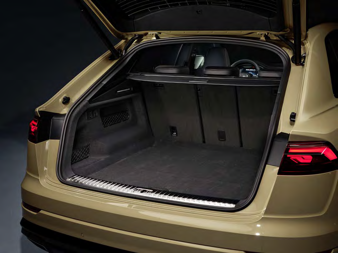 Audi Q8 — 605-litre luggage compartment expanding to 1,755 litres with the rear bench folded.